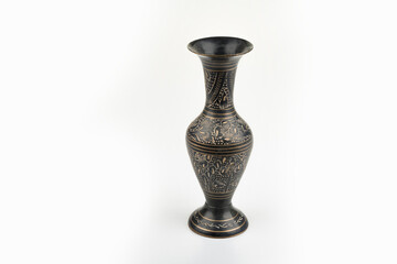 Black metal carving vase on a white