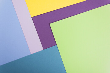 Abstract colored paper texture. Geometric shapes and lines. Minimalist background. Flat lay. Copy space.