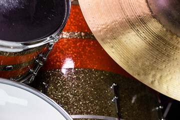 Closeup of drumsticks lying on the professional drum set. Drummer equipment. 