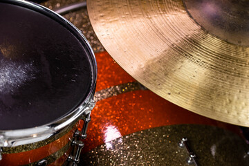 Closeup of drumsticks lying on the professional drum set. Drummer equipment. 