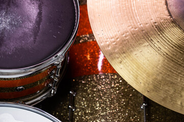 Closeup of drumsticks lying on the professional drum set. Drummer equipment. 