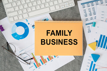 Family Business is written in a document on the office desk