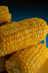 swings of ripe baked corn in a plate.