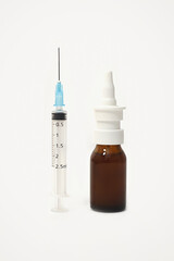 Vial of inhaled SARS-CoV-2 Vaccine for direct application to the lungs without needle stick and syringe on white background