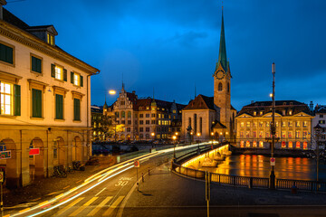 A long exposure image of the Münsterbrücker in Zürich at autumn evening
