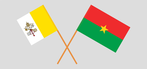 Crossed flags of Vatican and Burkina Faso