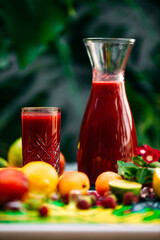 refreshing lemonade with fruits and berries on a decorated table