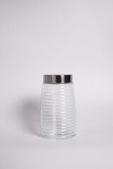 glass container for cereals with a lid. Isolated on a white background