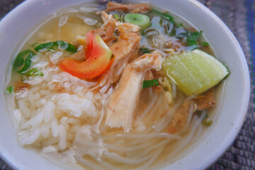 Indonesian traditional food. Soto Semarang from Central Java with additional vegetable cuts