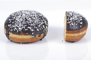 round donut with chocolate and sugar. Fat Thursday