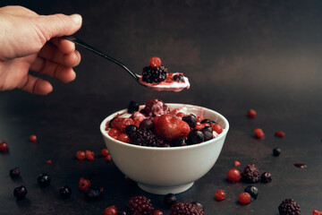 natural yogurt and red berries