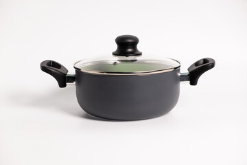 Stainless steel stewpot on white background