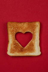 Obraz na płótnie Canvas Toast bread with heart shape. Valentine's Day concept 