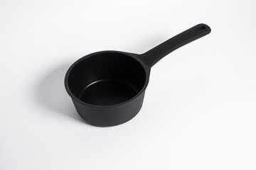 black frying pan isolated on a white background