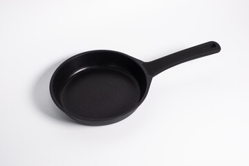 black frying pan isolated on a white background