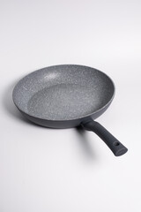 gray frying pan isolated on a white background