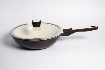gray frying pan isolated on a white background