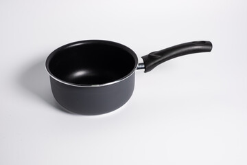 black stewpot on white background