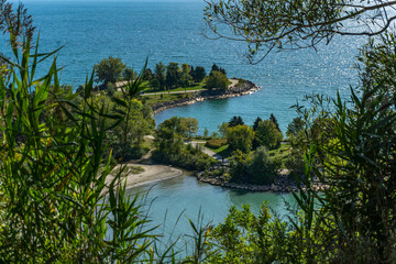 Aerial view of a beautiful park framed between branches near lake Ontario, Scarborough, Canada