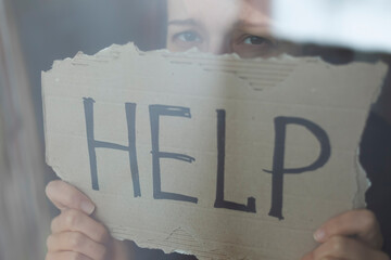 Violence concept. The woman asks for help.
