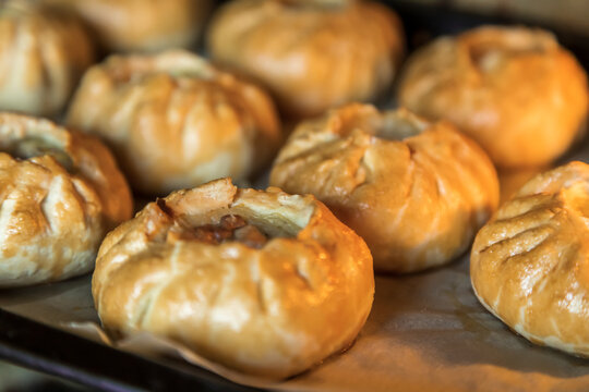 Group of individual pies with meat and potato - vak balish.