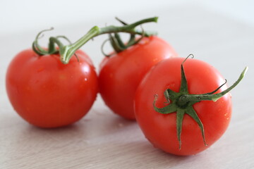 Fresh ripe tomatoes on a vine