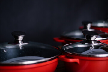 Set of grill pans on wooden table background