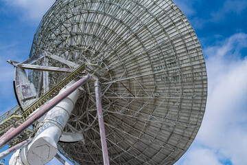 Satellite antenna dish for communication and signal reception out of the planet Earth.