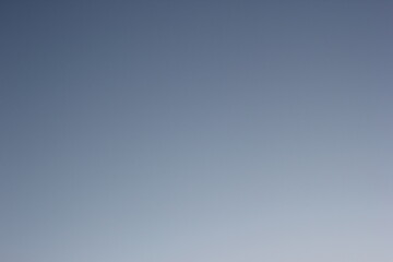 Clear light blue sky texture without clouds, morning winter background