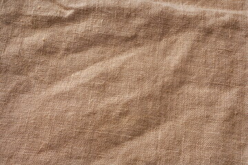 Cotton Burlap Cloth Fabric Background. Brown Hessian Jute Textile Napkin. Natural Organic Linen Tablecloth On Table.