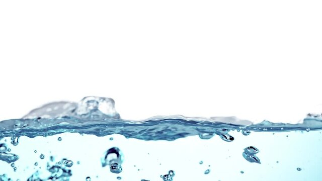 Super Slow Motion Shot of Water Surface at 1000fps on White Background.