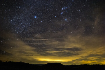 Meteor shower above Amboy Crater in California's Mojave Desert