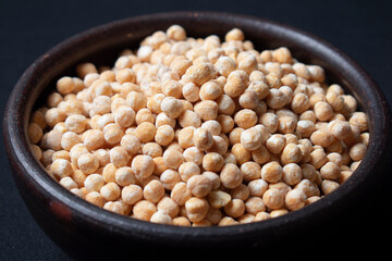 raw chickpeas in clay dish