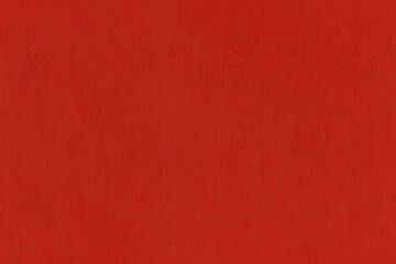 Cardboard red abstract pattern texture close-up. Retro old paper background. Grunge concrete wall. Vintage blank wallpaper.