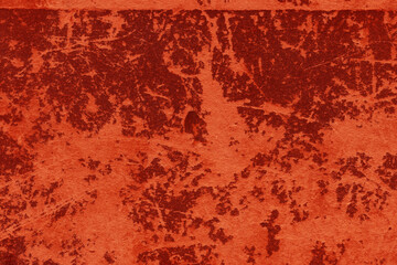 Cardboard red abstract pattern texture close-up. Retro old paper background. Grunge concrete wall. Vintage blank wallpaper.