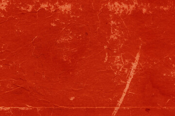 Cardboard red abstract pattern texture close-up. Retro old paper background. Grunge concrete wall. Vintage blank wallpaper.