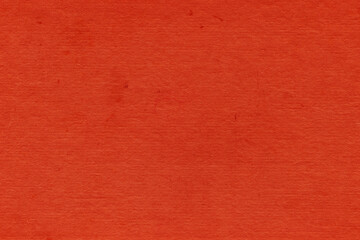 Fototapeta premium Cardboard red abstract pattern texture close-up. Retro old paper background. Grunge concrete wall. Vintage blank wallpaper.