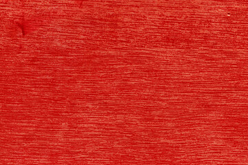 Cardboard red abstract pattern texture close-up. Retro old paper background. Grunge concrete wall. Vintage blank wallpaper.