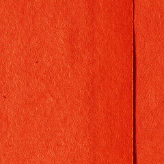 Fototapeta premium Cardboard red abstract pattern texture close-up. Retro old paper background. Grunge concrete wall. Vintage blank wallpaper.