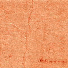 Cardboard red abstract pattern texture close-up. Retro old paper background. Grunge concrete wall. Vintage blank wallpaper.