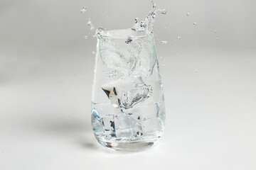 Glass of mineral carbonated water with ice