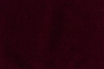 Cardboard red abstract pattern texture close-up. Retro old paper background. Grunge concrete wall. Vintage blank wallpaper.