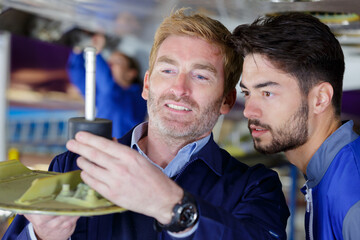 future mechanical engineer demonstrating assembling technique