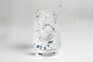 Glass of mineral carbonated water with ice