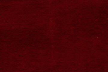 Cardboard red abstract pattern texture close-up. Retro old paper background. Grunge concrete wall. Vintage blank wallpaper.