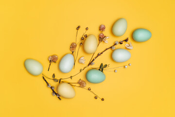 Fototapeta premium Creative flat lay photo of easter eggs on colorful background.