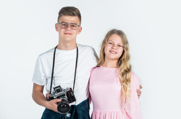 children with camera. photographer. kids friendship concept. hobby. family day. teen boy and girl