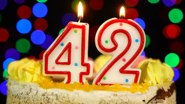 Number 42 Happy Birthday Cake With Burning Candles Topper.