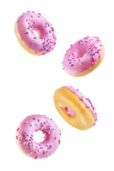Pink donut with pink and purple sprinkles on a white isolated background