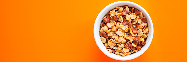 oat or corn flakes quick breakfast portion on the table for healthy meal snack outdoor top view copy space for text food background rustic image